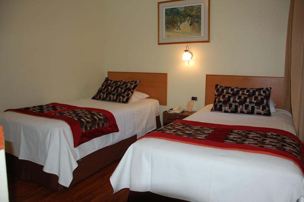Hotel Plaza Concepción Quarto foto